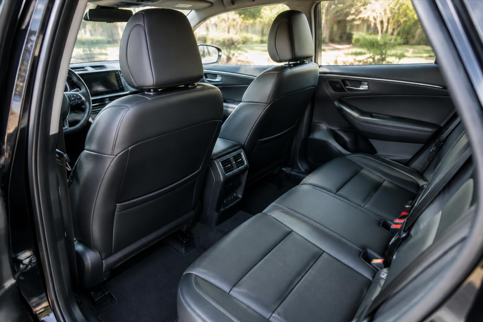 Clean backseat of a modern rideshare vehicle